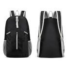 Black lightweight backpack with front zipper pocket, adjustable straps, and side mesh pockets. Ideal for travel, school, or hiking. Durable and stylish.