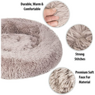 Round pet bed with premium soft faux fur, durable and warm, featuring strong stitches. Ideal for cats and small dogs seeking comfort and coziness.