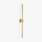 Modern gold wall sconce with sleek vertical design, minimalist lighting fixture, ideal for contemporary home decor and ambient illumination.