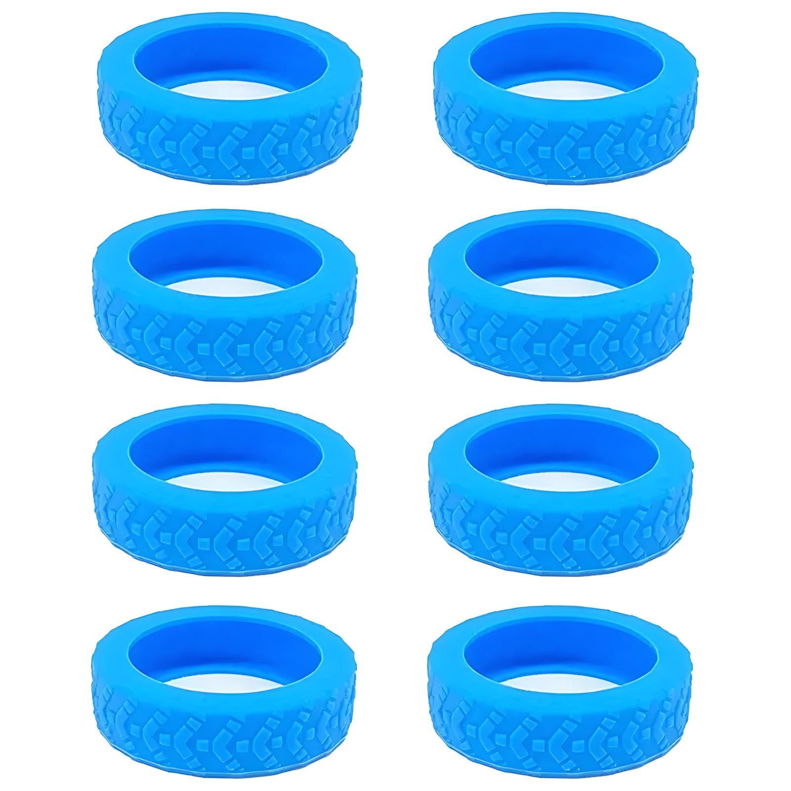 Eight blue silicone rubber tire bands with textured tread pattern, arranged in two rows. Ideal for toy cars, RC vehicles, or DIY projects.