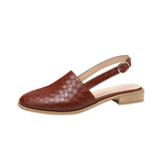 Brown leather slingback shoe with a low block heel and textured checkered pattern, ideal for casual and formal wear. Fashionable women's footwear.