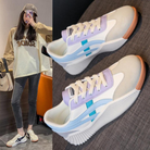 Trendy women's sneakers with pastel accents, featuring a unique ribbed sole design. Perfect for casual wear and fashion-forward street style.