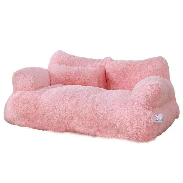 Plush pink pet bed, cozy and soft, ideal for small dogs or cats. Luxurious faux fur design, perfect for comfort and style in pet accessories.