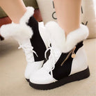 Women's winter platform boots with thick fur lining, black and white design, lace-up front, and side zipper. Warm ankle snow boots for women.