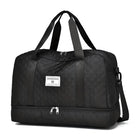 Black quilted travel duffel bag with dual handles and shoulder strap, featuring a spacious main compartment and front logo patch. Ideal for luggage.