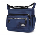 Blue PUANTI messenger bag with multiple zippered compartments, adjustable shoulder strap, and professional design. Ideal for travel and daily use.