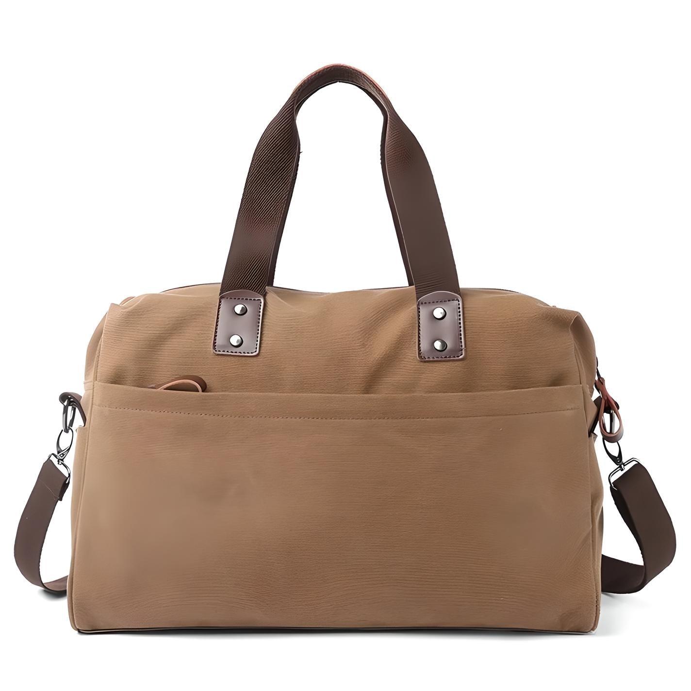 Tan canvas duffel bag with brown leather handles and detachable shoulder strap, featuring a front pocket. Ideal for travel and weekend getaways.