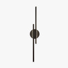 Modern black wall sconce with minimalist design, featuring two vertical bars and a circular base. Ideal for contemporary home lighting decor.