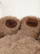 Fluffy brown bear paw slippers, plush indoor footwear, cozy and warm, perfect for lounging.