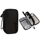 Black travel cable organizer bag with multiple compartments, mesh pockets, and zipper closure. Ideal for storing electronics accessories and cords.