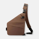 Brown crossbody sling bag with adjustable strap, modern geometric design, and secure buckle closure. Ideal for travel, casual outings, and daily use.