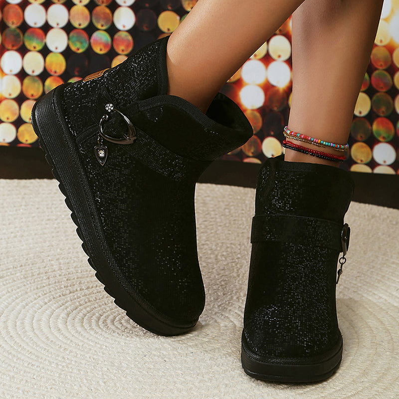 Black women's snow boots with buckle, plush lining, and non-slip sole, perfect for winter 2023. Waterproof, stylish, and warm ankle boots.