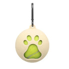 Beige pet tag with paw print cutout, revealing a green tennis ball design. Durable keychain clip. Perfect for dog collars. Pet accessories.