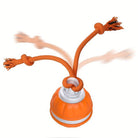 Interactive dog toy with orange rubber base and three knotted ropes, designed for pet play and mental stimulation. Durable, engaging pet accessory.