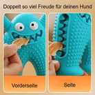 Blue monster-shaped dog chew toy with textured surface and treat holder, designed for dental health and interactive play. Perfect for active dogs.