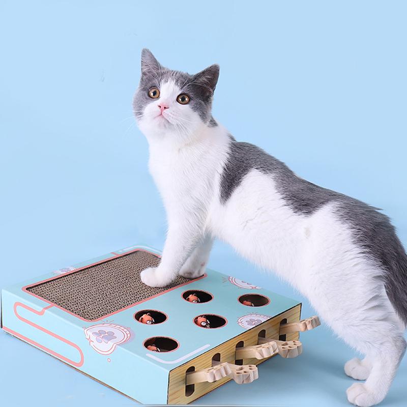 Interactive cat toy with a gray and white cat; features a scratching pad and pop-up holes for engaging play. Perfect for feline entertainment and exercise.