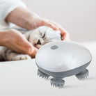 Electric cat massager with rotating nodes, designed for pet relaxation and grooming, shown near a content cat being petted. Ideal for stress relief.