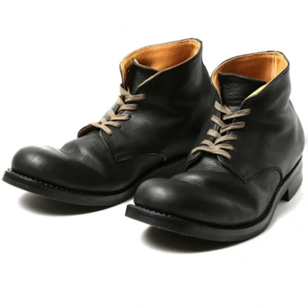 Black leather ankle boots with beige laces, featuring a round toe and sturdy sole. Perfect for men's fashion, casual wear, and durable footwear.