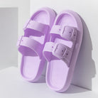 Purple EVA bathroom slippers with buckle design, non-slip sole, ideal for summer indoor use. Comfortable home sandals for men and women.