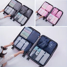 Travel packing cubes in suitcases, organized for efficient luggage storage. Includes pink, blue, and gray sets, ideal for travel organization and space-saving.