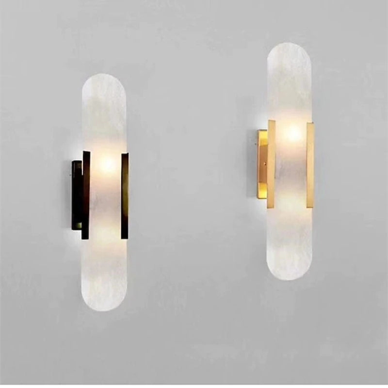 Modern wall-mounted reading light sconces in black and gold finish, featuring sleek design and ambient lighting, ideal for contemporary home decor.