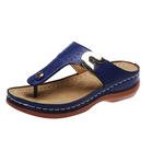 Women's blue wedge flip-flop sandal with arch support, featuring a quilted insole and metallic accent. Perfect for summer casual and dressy occasions.