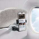 Airplane phone holder attached to seat, displaying a smartphone with news. Ideal for travel convenience, hands-free viewing, and in-flight entertainment.