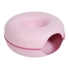 Pink donut-shaped cat bed with tunnel entrance, scratch-resistant felt, ideal for interactive pet play and cozy sleeping. Perfect for cat lovers.