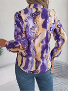 Elegant tie-dye women's shirt with autumn puff long sleeves in vibrant purple and beige tones, perfect for casual wear. Fashionable and trendy blouse.