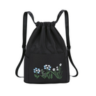 Black drawstring backpack with floral embroidery, featuring adjustable straps and a front pocket. Ideal for travel, fitness, and short-distance trips.