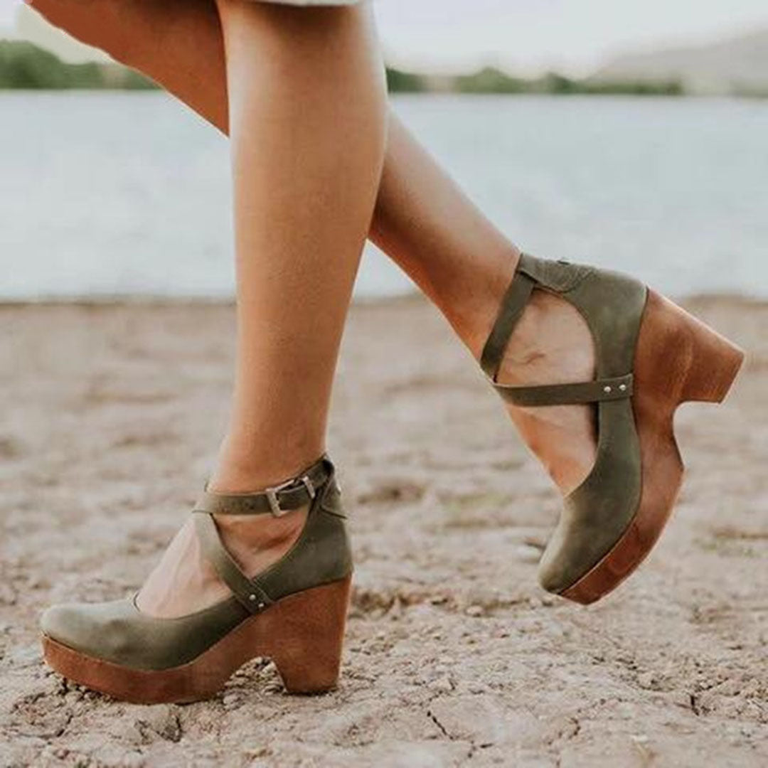 Women's green suede platform heels with ankle straps, wooden block heels, and cross-strap design, perfect for summer fashion and beach outings.