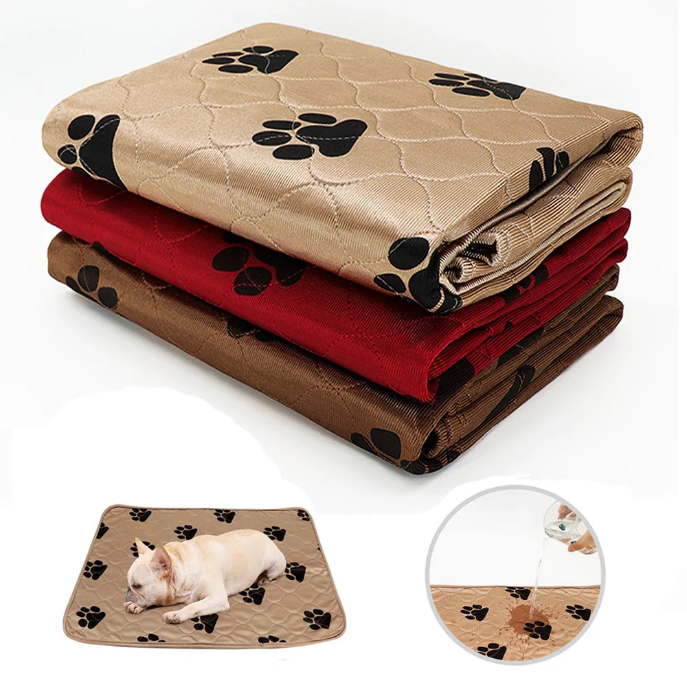 Waterproof pet blanket, beige with black paw prints, stack of three, durable, washable fabric.