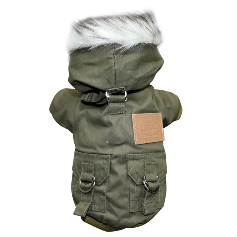 Green dog winter coat with faux fur hood, dual pockets, and metal D-rings. Stylish pet apparel for cold weather. Durable and fashionable design.