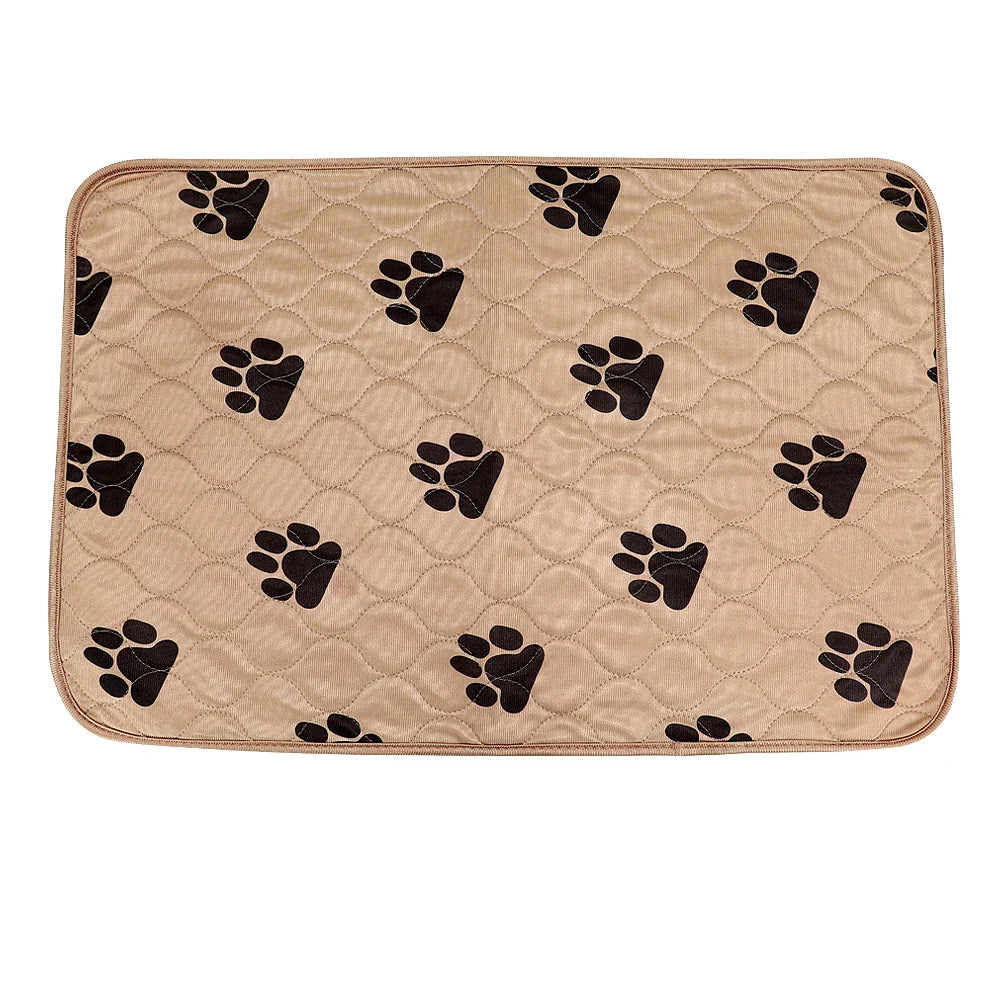 Beige quilted pet mat with black paw print design, waterproof, non-slip, for dogs and cats.