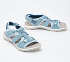 Light blue women's strappy sandals with adjustable Velcro straps, cushioned footbed, and durable sole. Perfect for casual summer wear and outdoor activities.