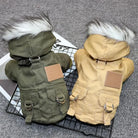 Dog winter coats with faux fur hoods in olive green and beige, featuring adjustable straps and pockets, perfect for pet warmth and style.