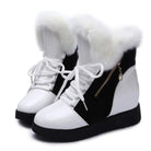 White and black women's platform winter boots with thick fur lining, lace-up front, and side zipper. Stylish snow boots for warmth and comfort.