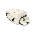 Beige travel backpack with shoe compartment, multiple pockets, and sleek design. Ideal for gym, travel, and daily use. Durable and stylish accessory.