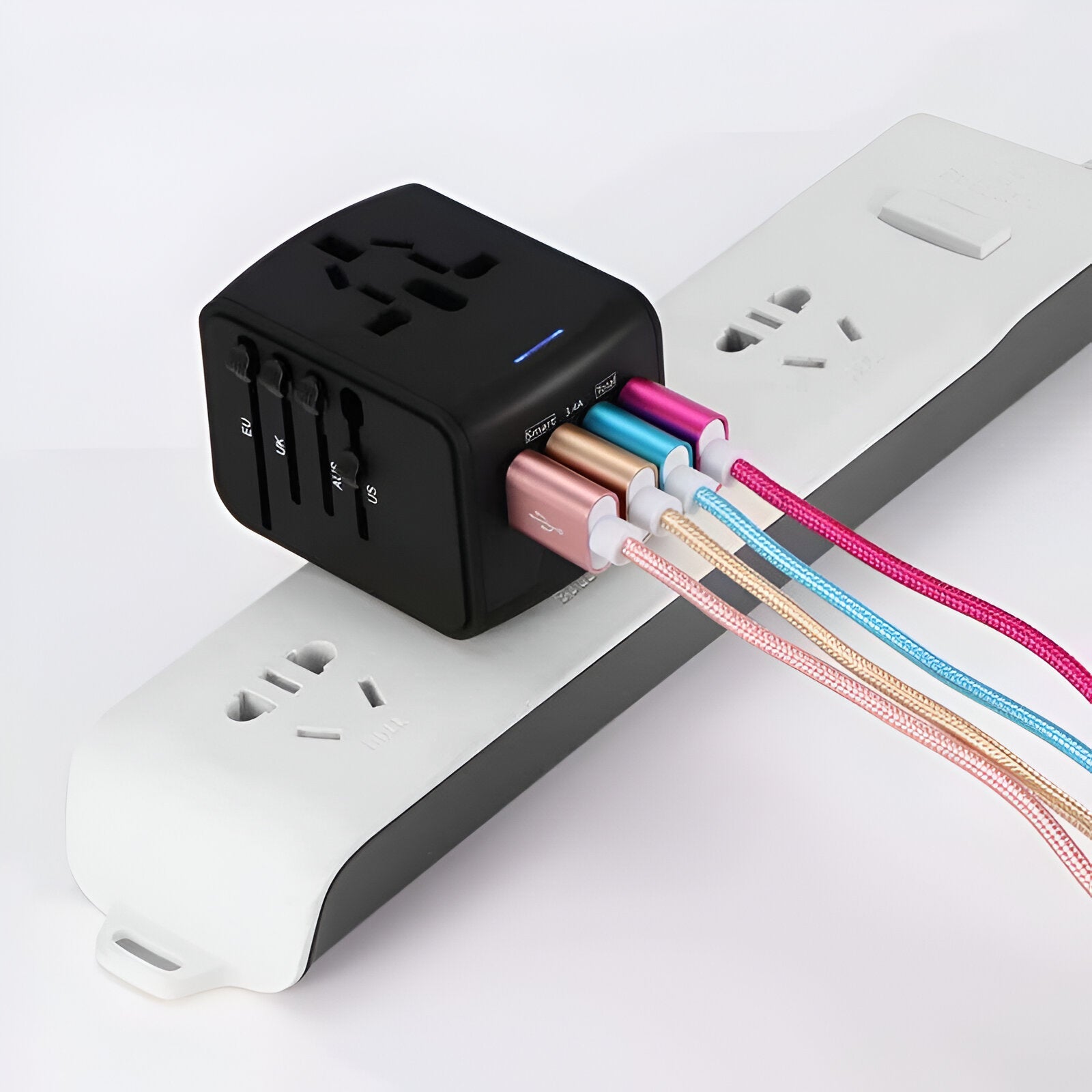 Universal travel adapter with multiple USB ports connected to colorful charging cables on a power strip. Ideal for international charging solutions.