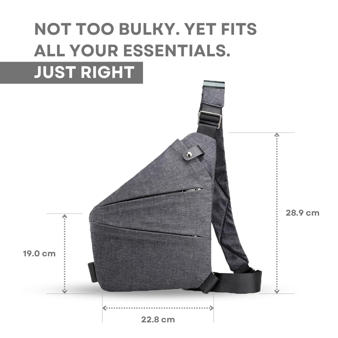 Sleek gray crossbody sling bag with adjustable strap, compact design, and multiple zippered compartments. Ideal for essentials. Dimensions: 22.8 x 19 x 28.9 cm.