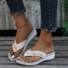 Women's orthopedic wedge sandals with arch support, featuring beige straps and decorative buttons, perfect for casual outdoor wear.