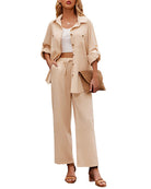 Woman wearing a stylish khaki two-piece outfit with a button-up shirt and wide-leg pants, holding a woven clutch. Fashionable casual attire.