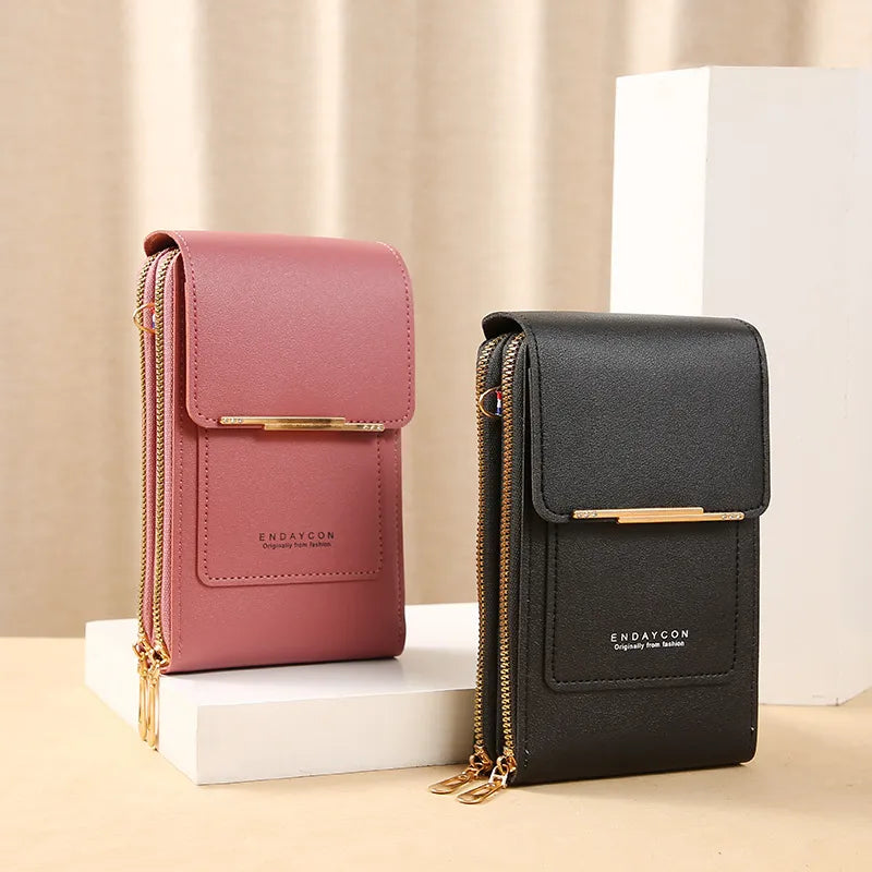 Elegant ladies' shoulder bags in pink and black with gold zippers, perfect for fashion-forward women. Stylish, versatile, and ideal for everyday use.