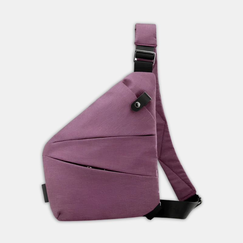 Magenta sling bag with adjustable strap, modern design, and secure buckle. Ideal for travel and daily use. Stylish crossbody bag for men and women.