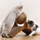 Two cats playing on a wooden cat scratcher with a sisal ball, perfect for feline exercise and entertainment. Ideal pet furniture for active cats.