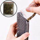 Cat wall brush with gray bristles, includes catnip pouch for grooming and play.