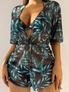 Sheer tropical leaf print beach cover-up with deep V-neck and short sleeves, perfect for summer swimwear fashion and resort wear.