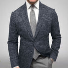 Men's dark gray tweed blazer, formal suit jacket, tailored fit, with gray tie and white shirt.