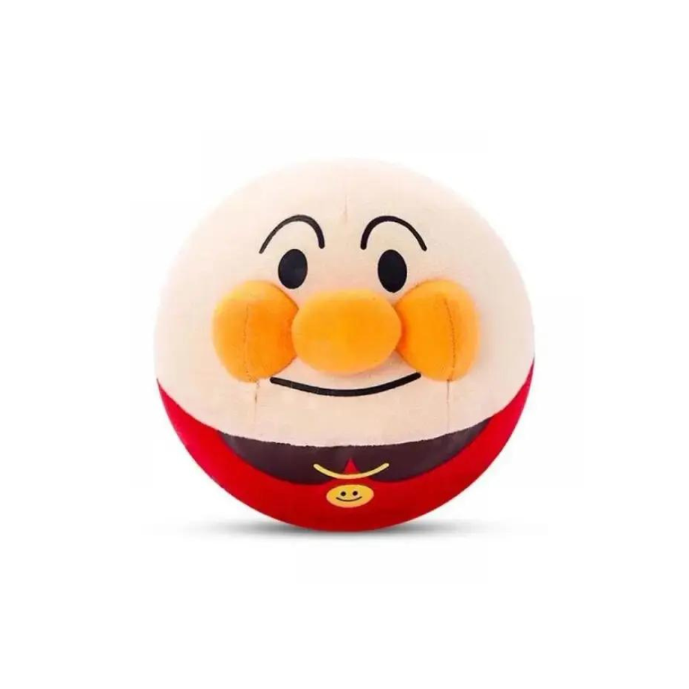 Round plush toy with a smiling face, orange cheeks, and red body. Cute stuffed doll for kids, perfect for gifts and nursery decor.