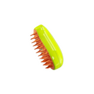 Bright green and orange scalp massager brush with ergonomic handle and flexible bristles, ideal for hair care, detangling, and promoting scalp health.